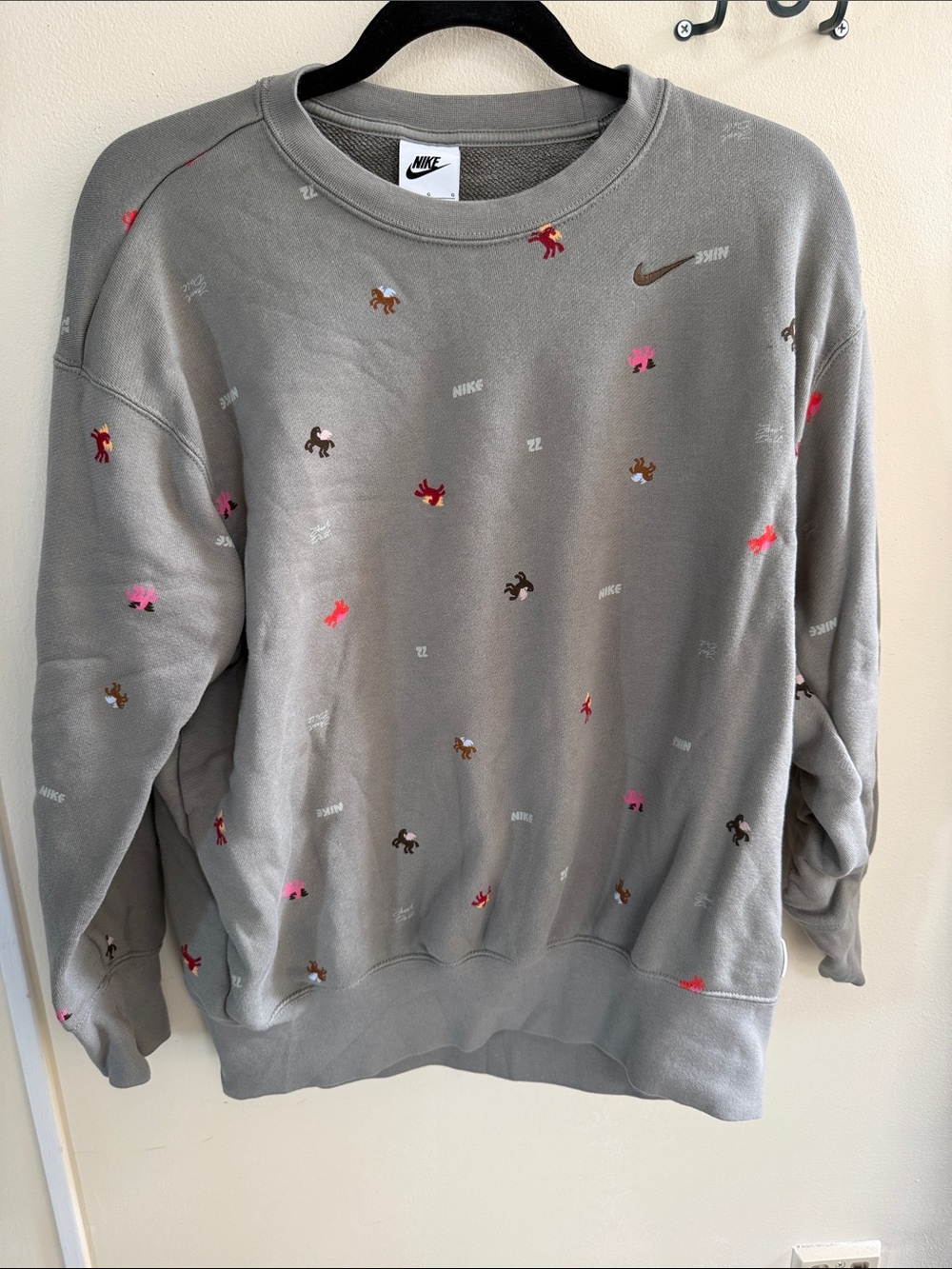 Nike Gray Crewneck Sweatshirt with Multicolor Pegasus Design